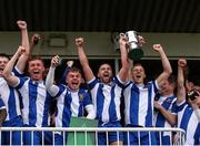 19 April 2025; College Corinthians AFC captain Craig Donnellan, centre, lifts the cup with teammates after their side's victory in the FAI Intermediate Cup final match between College Corinthians AFC and Ringmahon Rangers FC at Turners Cross Stadium in Cork. Photo by Michael P Ryan/Sportsfile