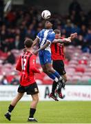 19 April 2025; Destiny Okonkwo of College Corinthians AFC in action against Anthony O'Donnell of Ringmahon Rangers FC during the FAI Intermediate Cup final match between College Corinthians AFC and Ringmahon Rangers FC at Turners Cross Stadium in Cork. Photo by Michael P Ryan/Sportsfile