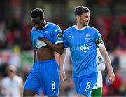 21 April 2025; Waterford players James Olayinka, left, and Padraig Amond during the SSE Airtricity Men's Premier Division match between Cork City and Waterford at Turners Cross in Cork. Photo by Seb Daly/Sportsfile