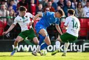 21 April 2025; Kacper Radkowski of Waterford in action against Cathal O'Sullivan, left, and Kitt Nelson of Cork City during the SSE Airtricity Men's Premier Division match between Cork City and Waterford at Turners Cross in Cork. Photo by Seb Daly/Sportsfile
