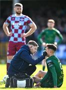 21 April 2025; Mason Melia of St Patrick's Athletic receives medical attention during the SSE Airtricity Men's Premier Division match between Drogheda United and St Patrick's Athletic at Sullivan & Lambe Park in Drogheda, Louth. Photo by Shauna Clinton/Sportsfile