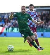 21 April 2025; Ryan McLaughlin of St Patrick's Athletic in action against Ryan Brennan of Drogheda United during the SSE Airtricity Men's Premier Division match between Drogheda United and St Patrick's Athletic at Sullivan & Lambe Park in Drogheda, Louth. Photo by Shauna Clinton/Sportsfile