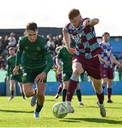 21 April 2025; Mason Melia of St Patrick's Athletic in action against James Bolger of Drogheda United during the SSE Airtricity Men's Premier Division match between Drogheda United and St Patrick's Athletic at Sullivan & Lambe Park in Drogheda, Louth. Photo by Shauna Clinton/Sportsfile