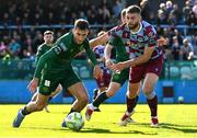 21 April 2025; Mason Melia of St Patrick's Athletic in action against Conor Keeley of Drogheda United during the SSE Airtricity Men's Premier Division match between Drogheda United and St Patrick's Athletic at Sullivan & Lambe Park in Drogheda, Louth. Photo by Shauna Clinton/Sportsfile