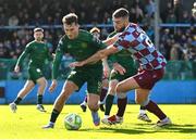 21 April 2025; Mason Melia of St Patrick's Athletic in action against Conor Keeley of Drogheda United during the SSE Airtricity Men's Premier Division match between Drogheda United and St Patrick's Athletic at Sullivan & Lambe Park in Drogheda, Louth. Photo by Shauna Clinton/Sportsfile