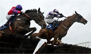 22 April 2025; Custom Taylor, with Kevin Sexton up, right, leads Andy Amo, with Sean Flanagan up, who finished second, over the last on their way to winning The Irish Stallion Farms EBF Novice Handicap Hurdle Series Final on rescheduled day one of the Fairyhouse Easter Festival at Fairyhouse Racecourse in Ratoath, Meath. Photo by Shauna Clinton/Sportsfile