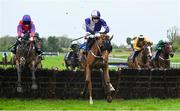 22 April 2025; Custom Taylor, with Kevin Sexton up, centre, leads Andy Amo, with Sean Flanagan up, left, who finished second, over the last on their way to winning The Irish Stallion Farms EBF Novice Handicap Hurdle Series Final on rescheduled day one of the Fairyhouse Easter Festival at Fairyhouse Racecourse in Ratoath, Meath. Photo by Shauna Clinton/Sportsfile