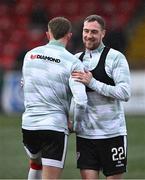 22 April 2025; Kevin Holt, right, shares a joke with Derry City teammate Sam Todd before the SSE Airtricity Men's Premier Division match between Derry City and Sligo Rovers at The Ryan McBride Brandywell Stadium in Derry. Photo by Ben McShane/Sportsfile
