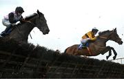 22 April 2025; Autoportrait, with Darragh O'Keeffe up, left, and Blaze The Way, with Danny Mullins up, jump the last 'first time round' during The Irish Stallion Farms EBF Novice Handicap Hurdle Series Final (Listed) on rescheduled day one of the Fairyhouse Easter Festival at Fairyhouse Racecourse in Ratoath, Meath. Photo by Shauna Clinton/Sportsfile