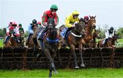 22 April 2025; Le Grand Peinture, with Jack Gilligan up, left, and American Money, with Cian Cullinan up, right, clear the last 'first time round' during The RYBO Handicap Hurdle (Listed) on rescheduled day one of the Fairyhouse Easter Festival at Fairyhouse Racecourse in Ratoath, Meath. Photo by Shauna Clinton/Sportsfile