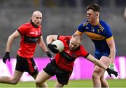 25 January 2025; Seán Óg Ó Loideáin of An Cheathrú Rua is tackled by Kevin Lynch of Naomh Padraig during the AIB GAA Football All-Ireland Junior Club Championship final match between An Cheathrú Rua of Galway and Naomh Padraig Uisce Chaoin of Donegal at Croke Park in Dublin. Photo by Stephen McCarthy/Sportsfile