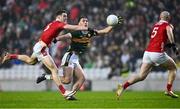 19 April 2025; David Clifford of Kerry in action against Daniel O'Mahony of Cork during the Munster GAA Football Senior Championship semi-final match between Cork and Kerry at Supervalu Páirc Uí Chaoimh in Cork. Photo by Piaras Ó Mídheach/Sportsfile