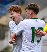 24 April 2025; Adam Brennan of Republic of Ireland celebrates with teammate Oisin Kelly, right, after scoring their side's first goal during the Centenary Shield match between Republic of Ireland and England at Athlone Town Stadium in Lissywollen, Westmeath. Photo by Ben McShane/Sportsfile