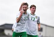 24 April 2025; Jack Sweeney of Republic of Ireland celebrates with teammate Oisin Kelly, right, after scoring their side's second goal during the Centenary Shield match between Republic of Ireland and England at Athlone Town Stadium in Lissywollen, Westmeath. Photo by Ben McShane/Sportsfile
