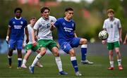 24 April 2025; Joseph Kennedy of England in action against Matt Jones of Republic of Ireland during the Centenary Shield match between Republic of Ireland and England at Athlone Town Stadium in Lissywollen, Westmeath. Photo by Ben McShane/Sportsfile