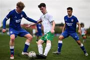 24 April 2025; Callum Lynch of Republic of Ireland in action against Luke Jones, left, and Joseph Kennedy of England during the Centenary Shield match between Republic of Ireland and England at Athlone Town Stadium in Lissywollen, Westmeath. Photo by Ben McShane/Sportsfile