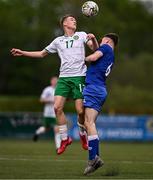 24 April 2025; Jack Sweeney of Republic of Ireland in action against Patrick McGowran of England during the Centenary Shield match between Republic of Ireland and England at Athlone Town Stadium in Lissywollen, Westmeath. Photo by Ben McShane/Sportsfile