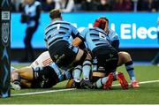 25 April 2025; Mike Haley of Munster scores his side's second try during the United Rugby Championship match between Cardiff and Munster at Cardiff Arms Park in Cardiff, Wales. Photo by Chris Fairweather/Sportsfile