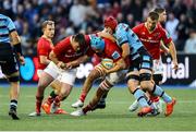 25 April 2025; Tadhg Beirne of Munster is tackled by James Botham of Cardiff during the United Rugby Championship match between Cardiff and Munster at Cardiff Arms Park in Cardiff, Wales. Photo by Chris Fairweather/Sportsfile