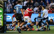25 April 2025; Mike Haley of Munster celebrates with team mates after scoring his side's second try during the United Rugby Championship match between Cardiff and Munster at Cardiff Arms Park in Cardiff, Wales. Photo by Chris Fairweather/Sportsfile