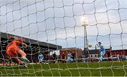 25 April 2025; Chris Forrester of St Patrick's Athletic scores his side's first goal, from a penalty, past Bohemians goalkeeper Kacper Chorazka, during the SSE Airtricity Men's Premier Division match between Bohemians and St Patrick's Athletic at Dalymount Park in Dublin. Photo by Seb Daly/Sportsfile