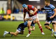 25 April 2025; Tadhg Beirne of Munster is challenged by Josh Adams of Cardiff during the United Rugby Championship match between Cardiff and Munster at Cardiff Arms Park in Cardiff, Wales. Photo by Kian Abdullah/Sportsfile