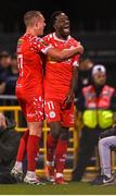 25 April 2025; Mipo Odubeko of Shelbourne celebrates with team-mate Evan Caffrey after scoring their side's second goal during the SSE Airtricity Men's Premier Division match between Shamrock Rovers and Shelbourne at Tallaght Stadium in Dublin. Photo by Ramsey Cardy/Sportsfile