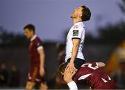 25 April 2025; Darragh Markey of Drogheda United reacts, while sitting on Cian Byrne of Galway United, during the SSE Airtricity Men's Premier Division match between Galway United v Drogheda United at Eamonn Deacy Park in Galway. Photo by Piaras Ó Mídheach/Sportsfile