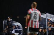 25 April 2025; Derry City manager Tiernan Lynch watches on as Mark Connolly of Derry City prepares to take a throw-in during the SSE Airtricity Men's Premier Division match between Waterford and Derry City at the Regional Sports Centre in Waterford. Photo by Tyler Miller/Sportsfile