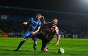 25 April 2025; Mark Connolly of Derry City is fouled by Kyle White of Waterford during the SSE Airtricity Men's Premier Division match between Waterford and Derry City at the Regional Sports Centre in Waterford. Photo by Tyler Miller/Sportsfile