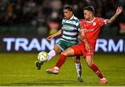 25 April 2025; Victor Ozhianvuna of Shamrock Rovers in action against John O'Sullivan of Shelbourne during the SSE Airtricity Men's Premier Division match between Shamrock Rovers and Shelbourne at Tallaght Stadium in Dublin. Photo by David Fitzgerald/Sportsfile