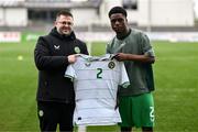 24 April 2025; Republic of Ireland head coach Derek O'Brien with Alain Kizenga of Republic of Ireland before the Centenary Shield match between Republic of Ireland and England at Athlone Town Stadium in Lissywollen, Westmeath. Photo by Ben McShane/Sportsfile
