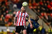22 April 2025; Mark Connolly of Derry City and Francely Lomboto of Sligo Rovers during the SSE Airtricity Men's Premier Division match between Derry City and Sligo Rovers at The Ryan McBride Brandywell Stadium in Derry. Photo by Ben McShane/Sportsfile