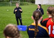 26 April 2025; Meath's Mary Kate Lynch, left, and Niamh Gallogly coaching during the 2025 ZuCar Gaelic4Teens Festival Day featuring players from Clann na Banna of Down, St Nicholas of Louth and Ratoath of Meath at Trim GAA Club, Meath. Photo by Piaras Ó Mídheach/Sportsfile