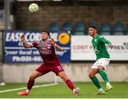25 April 2025; David Bosjnak of Cobh Ramblers in action against Michael Place of Finn Harps during the SSE Airtricity Men's First Division match between Cobh Ramblers and Finn Harps at St Colman's Park in Cobh, Cork. Photo by Michael P Ryan/Sportsfile