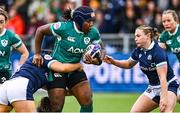 26 April 2025; Linda Djougang of Ireland, centre, is tackled by Ellianne Clarke, left, and Leia Brebner-Holden of Scotland during the Women's Six Nations Rugby Championship match between Scotland and Ireland at Hive Stadium in Edinburgh, Scotland. Photo by Paul Devlin/Sportsfile