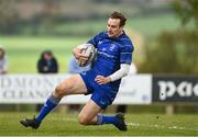 26 April 2025; Eoghan Duffy of Leinster goes past the Ulster defence on his way to scoring the first try during the Junior Interprovincial Rugby Championship round one match between Leinster and Ulster at Gorey RFC in Gorey, Wexford. Photo by Matt Browne/Sportsfile