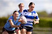 26 April 2025; Fiona Fennessy of Athy evades the tackle of Brooke Fagan of UCD during the Flood Plate Final match between Athy and UCD during the Leinster Rugby Girls Finals Day at Mullingar RFC in Mullingar, Westmeath. Photo by Ben McShane/Sportsfile