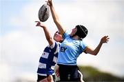 26 April 2025; Amy Lynch of Athy and Adi Cronin of UCD contest a lineout during the Flood Plate Final match between Athy and UCD during the Leinster Rugby Girls Finals Day at Mullingar RFC in Mullingar, Westmeath. Photo by Ben McShane/Sportsfile