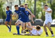 26 April 2025; Walter Walsh of Leinster goes past the tackle of Michael Orr of Ulster during the Junior Interprovincial Rugby Championship round one match between Leinster and Ulster at Gorey RFC in Gorey, Wexford. Photo by Matt Browne/Sportsfile