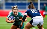 26 April 2025; Aiofe Dalton of Ireland in action against Helen Nelson of Scotland during the Women's Six Nations Rugby Championship match between Scotland and Ireland at Hive Stadium in Edinburgh, Scotland. Photo by Paul Devlin/Sportsfile