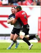 26 April 2025; Peter Dooley of Connacht is tackled by Ruben Schoeman of Emirates Lions during the United Rugby Championship match between Emirates Lions and Connacht at Emirates Airline Park in Johannesburg, South Africa. Photo by Shaun Roy/Sportsfile