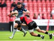 26 April 2025; Paul Boyle of Connacht is tackled by Bronson Mills of Emirates Lions during the United Rugby Championship match between Emirates Lions and Connacht at Emirates Airline Park in Johannesburg, South Africa. Photo by Shaun Roy/Sportsfile