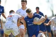 26 April 2025; Graham Reynolds of Leinster is tackled by Jonny Hunter of Ulster during the Junior Interprovincial Rugby Championship round one match between Leinster and Ulster at Gorey RFC in Gorey, Wexford. Photo by Matt Browne/Sportsfile