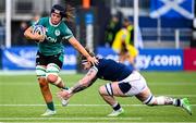 26 April 2025; Brittany Hogan of Ireland evades the tackle of Jade Konkel of Scotland during the Women's Six Nations Rugby Championship match between Scotland and Ireland at Hive Stadium in Edinburgh, Scotland. Photo by Paul Devlin/Sportsfile