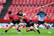 26 April 2025; Shane Jennings of Connacht is tackled by Bronson Mills and Henco van Wyk of Emirates Lions during the United Rugby Championship match between Emirates Lions and Connacht at Emirates Airline Park in Johannesburg, South Africa. Photo by Shaun Roy/Sportsfile