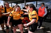 26 April 2025; Ashbourne captains Keela Walsh Fagherazzi, right, and Laura Scuffil celebrate with the Plate after the Cusack Plate Final match between Longford and Ashbourne during the Leinster Rugby Girls Finals Day at Mullingar RFC in Mullingar, Westmeath. Photo by Ben McShane/Sportsfile