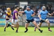 26 April 2025; John Hetherton of Dublin in action against Cian Molloy of Wexford during the Leinster GAA Hurling Senior Championship Round 2 match between Dublin and Wexford at Parnell Park in Dublin. Photo by David Fitzgerald/Sportsfile