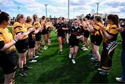 26 April 2025; Ashbourne players perform a guard of honour for the Longford players after the Cusack Plate Final match between Longford and Ashbourne during the Leinster Rugby Girls Finals Day at Mullingar RFC in Mullingar, Westmeath. Photo by Ben McShane/Sportsfile
