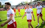26 April 2025; Darragh Canavan of Tyrone, centre, and teammates during the parade before Ulster GAA Football Senior Championship semi-final match between Armagh and Tyrone at St Tiernach's Park in Clones, Monaghan. Photo by Seb Daly/Sportsfile